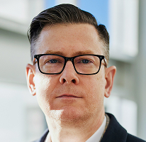 Alexander Hughes, CEO de una empresa de trading de criptomonedas, retrato